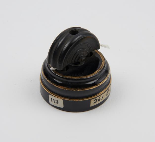 Ediswan black china socket with two-pin plug, c.1890 to 1930