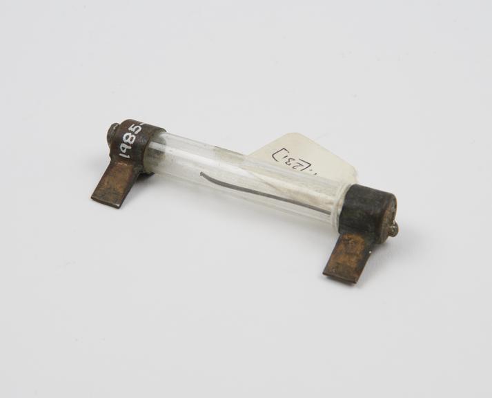 Glass fuse carrier, 5A brass ends, from Sudgrove House