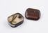 Mighty Atom crystal in original tin box; with tweezers