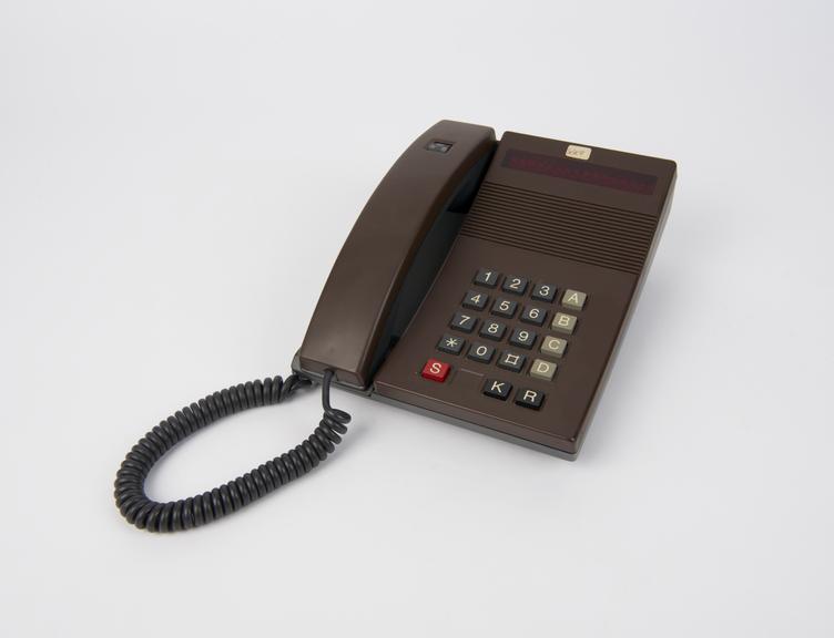 Telephone handset, two-tone brown and black, push button