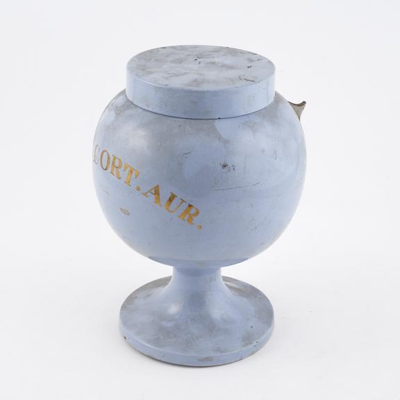 Blue earthenware syrup jar, globular body, neck and spout