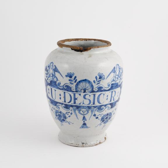 Tin-glazed earthenware drug jar, cherub motif