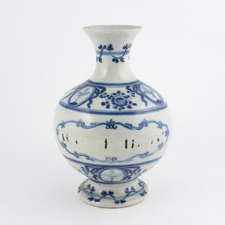 Blue and white pharmacy jar