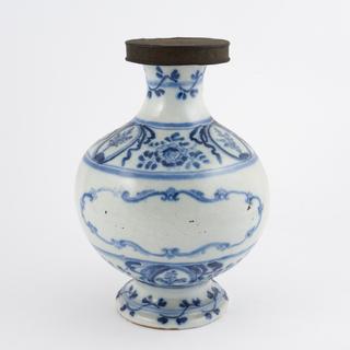 Blue and white pharmacy jar