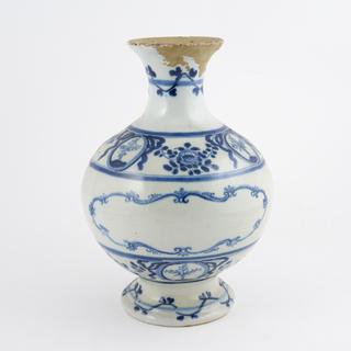 Blue and white pharmacy jar