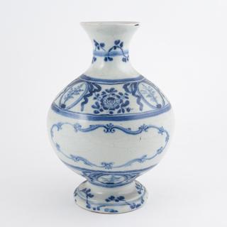 Blue and white pharmacy jar
