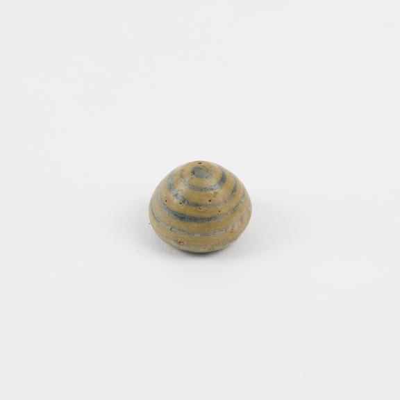 Earplug, cone with convex curved face and spiral design