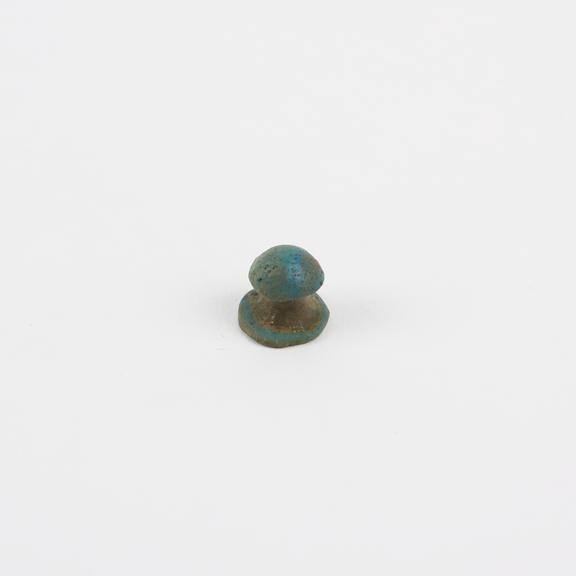 Turquoise earplug, cone with larger angle cone astride vertex