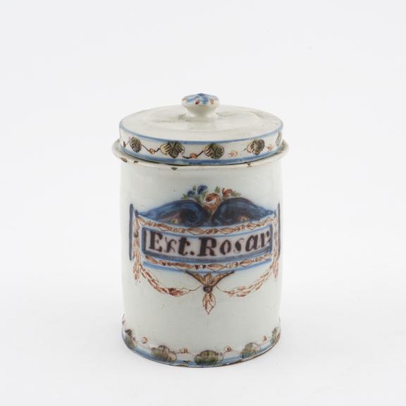 Cylindrical lidded drug jar, tin glazed earthenware