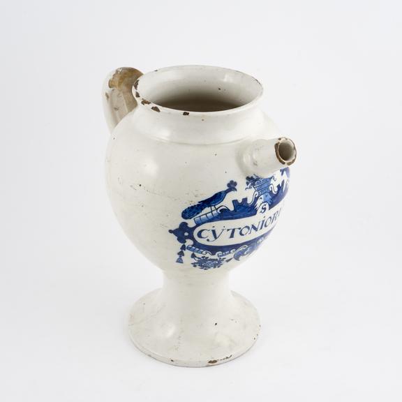 Tin glazed earthenware syrup jar, peacock motif