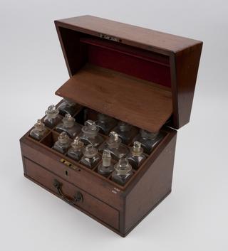 Rectangular medicine chest with front opening drawer