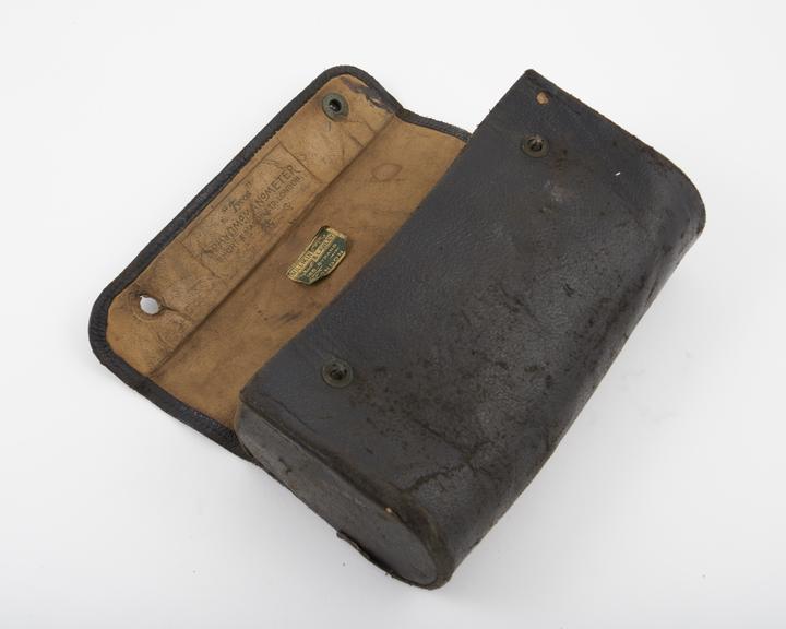 Leather case for sphygmomanometer, by Short and Mason Ltd