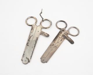 Two circumcision clamps