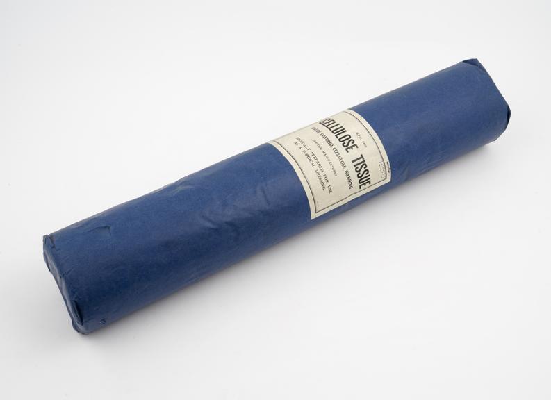 Large roll of cellulose tissue, in blue paper wrapping