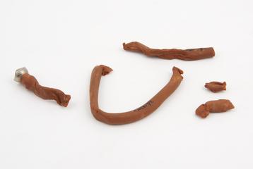 Length of rubber tubing with metal mount at one end