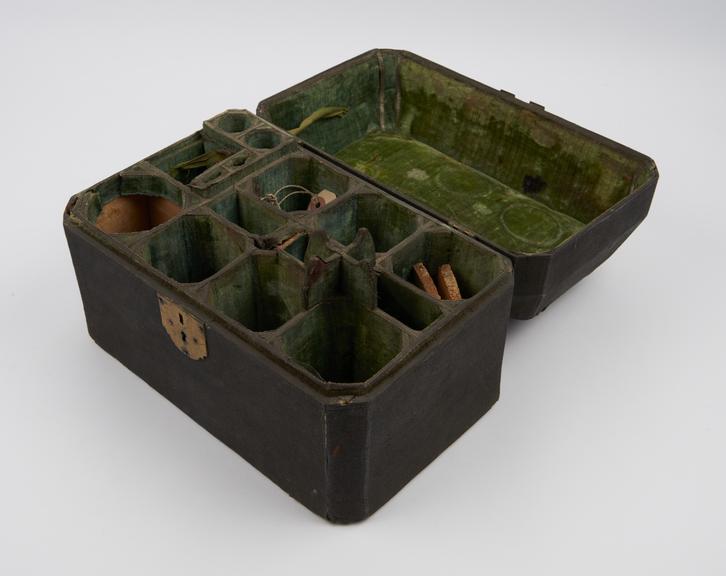 Wooden medicine chest covered with black shagreen