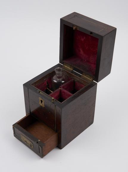 Rectangular medicine chest of rosewood inlaid with brass