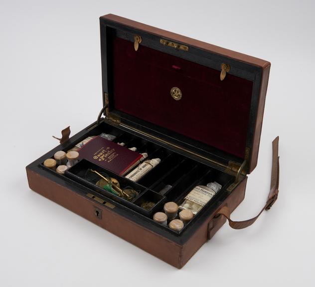 Rectangular medicine chest, wood covered with leather