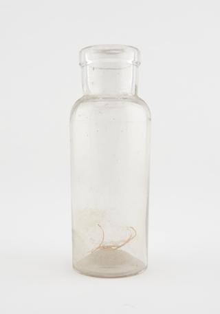 Glass specimen bottle, empty, English, 1901-1940