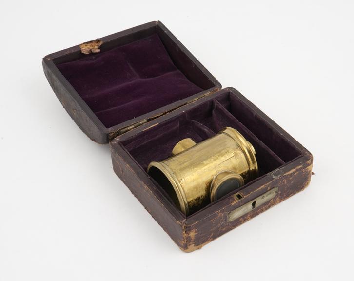 Candle holder from an aural speculum, with case