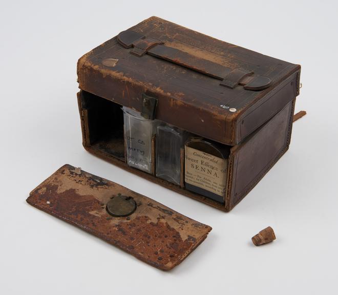 Rectangular leather medicine chest lined with leatherette and velvet