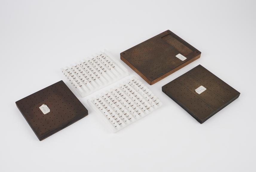 Three metal tweezer 'peg' boards with 93 nails