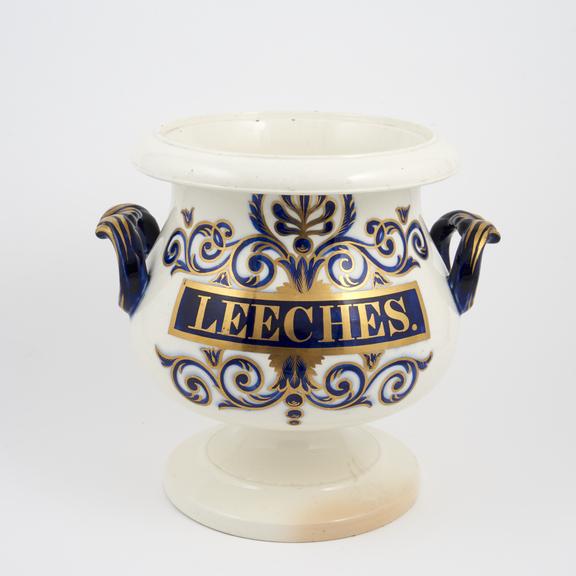 Pharmacy leech jar, ornate gilt earthenware, perhaps