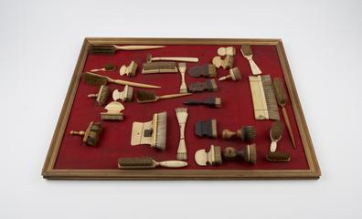 Brush with narrow row of bristles from base handle