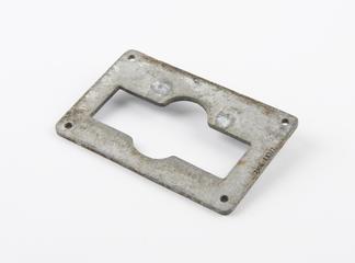 Slot for pennies, from arcade machine