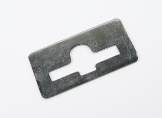 Slot for pennies, from arcade machine