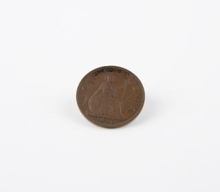 Penny from amusement arcade machine