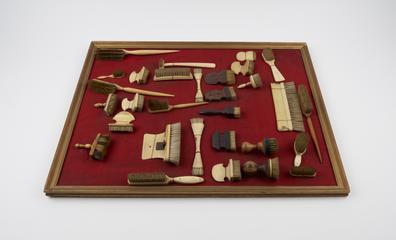 Small brush with wooden handle