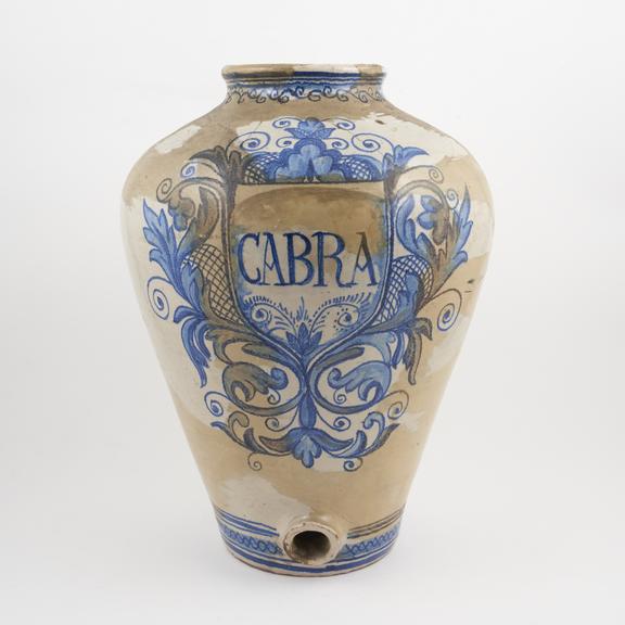 Drug jar, ceramic, tubular near base, inscribed Cabra