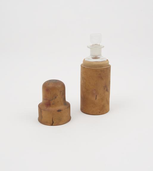 Ammonia bottle, in boxwood case, by Maw, 1870 to 1901