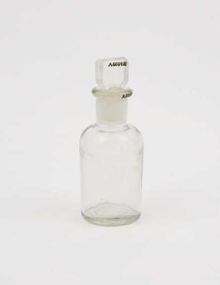 Glass bottle, from Dr. Wrigley's medicine case