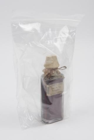 Bottle of alcoholic purgative