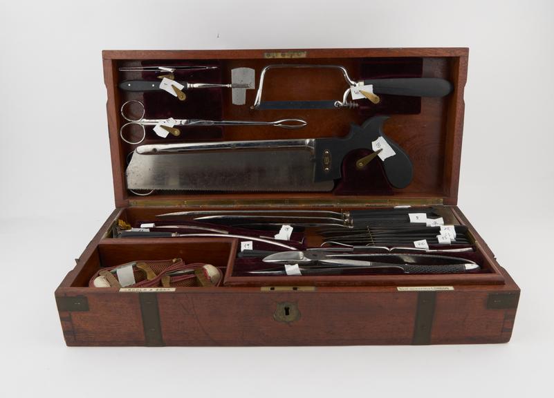 Surgical and dental instrument set, in brass bound mahogany box