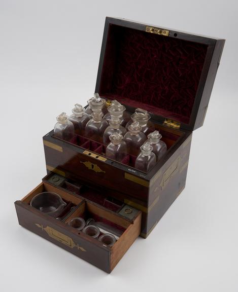 Brass bound medicine chest, with 15 unlabelled glass bottles