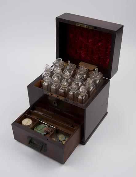 Rectangular mahogany medicine chest, contains 19 glass bottles