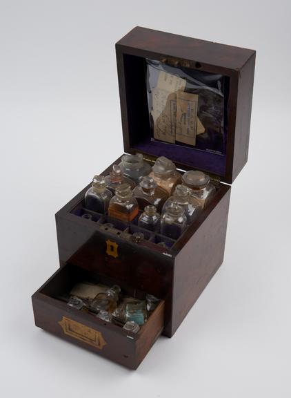 Medicine chest, mahogany, containing 20 glass bottles