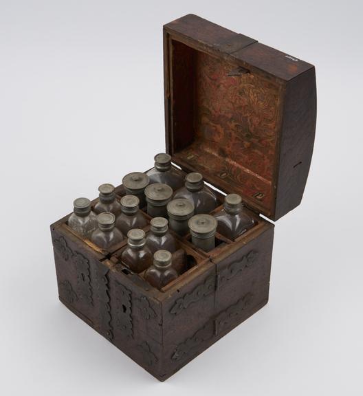 Small mahogany medicine chest with 2 hinged wing doors in front