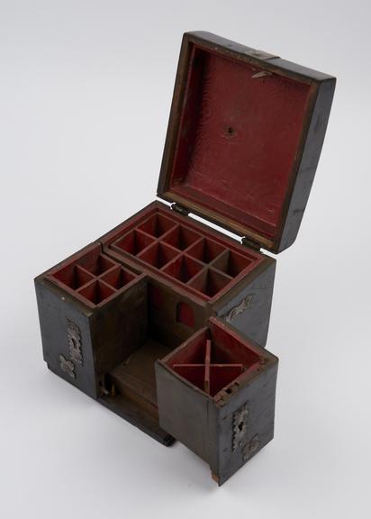 Small black lacquered wooden medicine chest with 2 hinged wing