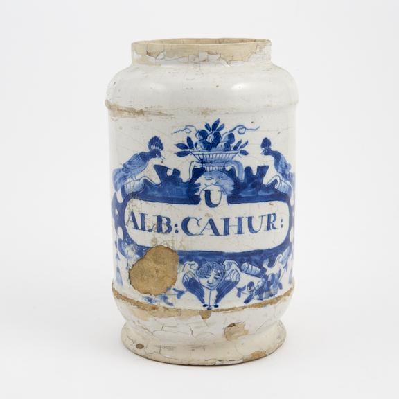 Tin glazed earthenware drug jar, peacock motif