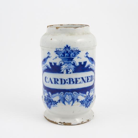 Tin glazed earthenware drug jar, peacock motif