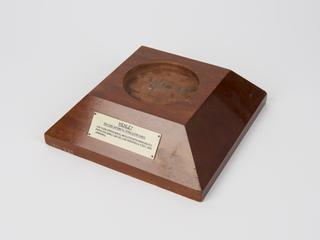 Wooden base for specimen of telescoped cable, 1895-1931