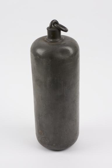 Big, cylindrical, pewter hot water bottle