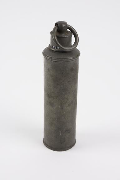 Cylindrical pewter hot water bottle with screw cap and ring