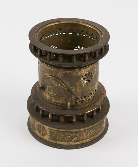 Complete brass food warmer in form of stove with detachable