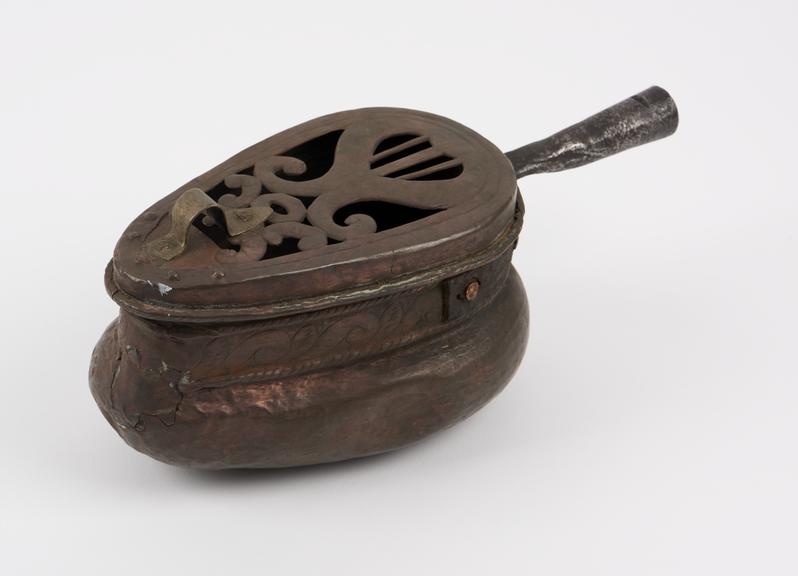 Copper warming pan, pear shaped, with hinged, pierced