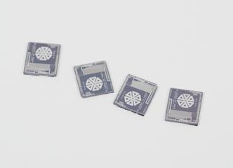 Four unpackaged Pipe Adaptor (FIFO) Chips